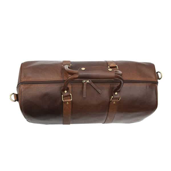 9001col w7 The Wombat Luxury Holdall is a chic and stylish holdall that comes in a rich, beautiful brown color. Its soft, supple leather gives you a luxurious look and feel that is unmatched.  This holdall’s best feature is the unbelievable leather quality. It’s made from oiled leather that is very thick that can stand up to anything you can throw at it.