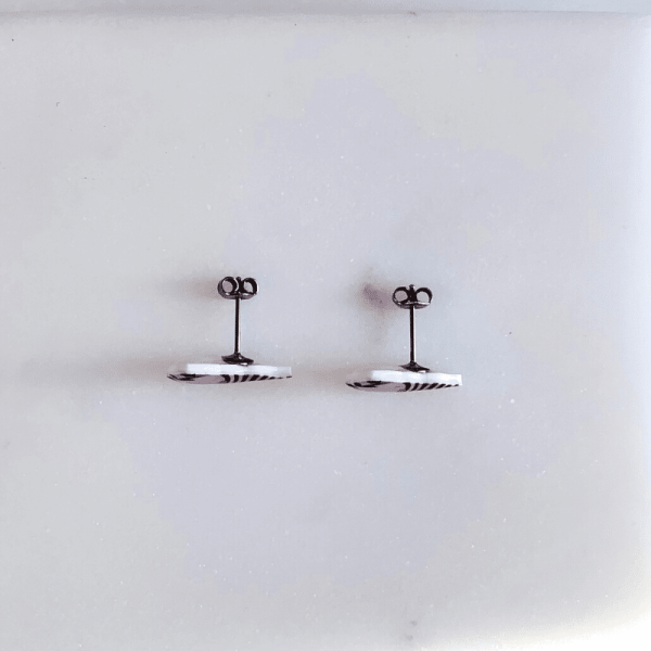 Butterfly push backs of stripy gonk/gnome stud earrings