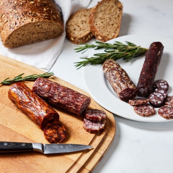 All Salamis 0518 scaled 1 scaled <div class="bundled_item_1677 bundled_product bundled_product_summary product thumbnail_hidden"> <div class="details"> <h4>What's included?</h4> </div> </div> <div class="bundled_item_1680 bundled_product bundled_product_summary product thumbnail_hidden"> <div class="details"> <div class="cart" data-title="Fennel & White Pepper Salami 55g" data-product_title="Fennel & White Pepper Salami 55g" data-visible="yes" data-optional_suffix="" data-optional="no" data-type="simple" data-bundled_item_id="1680" data-custom_data="[]" data-product_id="2572" data-bundle_id="20955"> <div class="bundled_item_wrap"> <div class="bundled_item_cart_content"> <div class="bundled_item_after_cart_details bundled_item_button">Sausage Roll (Pack of 2)</div> <div class="bundled_item_after_cart_details bundled_item_button">Steak & Ale Pie Medium 540g</div> <div class="bundled_item_after_cart_details bundled_item_button">Pork Pie (570g)</div> <div class="bundled_item_after_cart_details bundled_item_button">Fennel & White Pepper Salami 55g</div> <div class="bundled_item_after_cart_details bundled_item_button">Traditional Chutney with Wiltshire Ale 200g</div> </div> </div> </div> </div> </div>