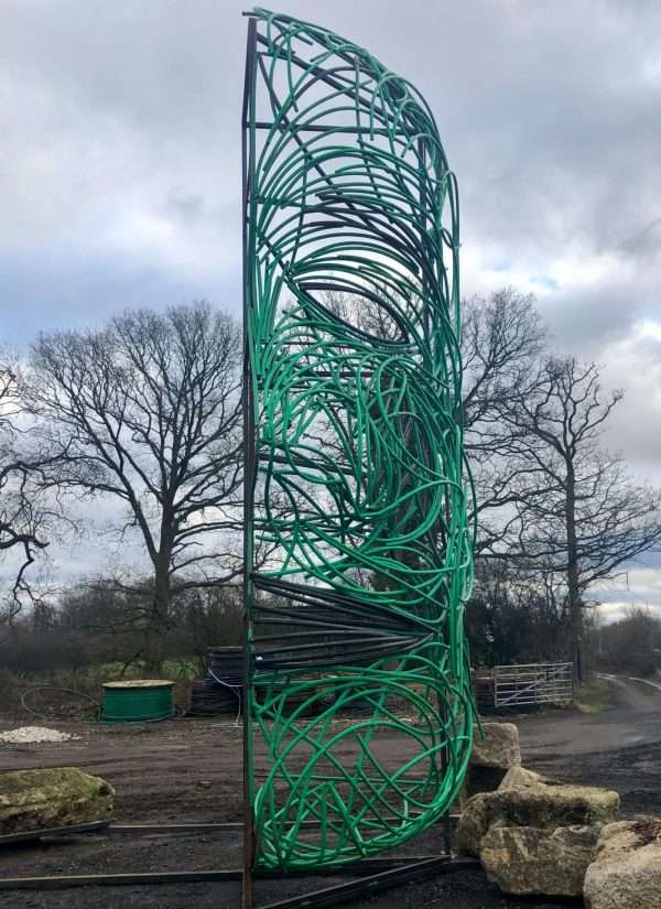 FACING FEARS SCULPTURE Gallery 3 Elliott of London 'Facing Fears'   By British Sculptor Charles Elliott This 9 Metres high abstract face sculpture was designed and handcrafted by Charles from recycled plastic tubes. Created in response to national fears of 2018, with Brexit and various other environmental issues surrounding global warming and Plastic Recycling. At present Recycling Markets send 500,000 tons of plastic a year to China to be recycled, which has been stopped as of 1st January 2018. This poses various issues to the UK Recycling Industry.   This large powerful and controversial sculpture can be seen on show outside Elliott of London NEW Berkhamsted Based Sculpture Studio next to A41. Charles and his team welcome visitors to see and picture the piece safely from their premises!   Studio Office - 01494758896 Charles - 07591730415 Website: www.elliottoflondon.co.uk Email: info@elliottoflondon.co.uk   #recycling #plasticrecycling #recycleplastic #ukrecycling #sculpture #artist #britishsculptor #charleselliott #humanface #faceart #femaleface #figurative #britishsculpture #abstractart #abstractsculpture #contraversial #globalwarming #enviromentalissues #recycledart #upcycled #upcycling #reuseable #renewable #waste #scrapplastics #hdpe #siliconeplastic