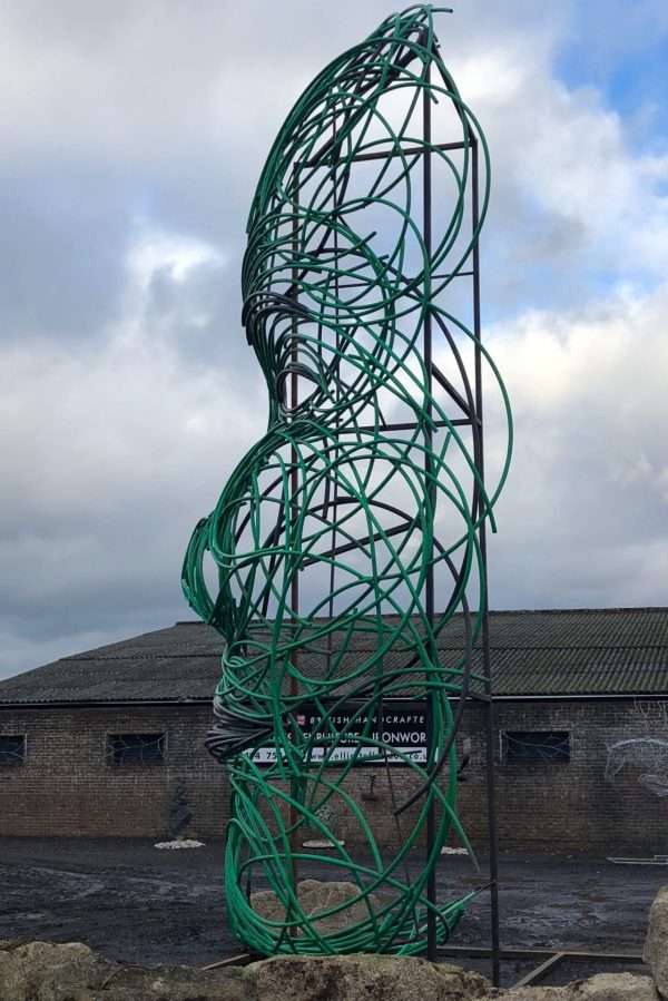 FACING FEARS SCULPTURE Gallery 6 Elliott of London 'Facing Fears'   By British Sculptor Charles Elliott This 9 Metres high abstract face sculpture was designed and handcrafted by Charles from recycled plastic tubes. Created in response to national fears of 2018, with Brexit and various other environmental issues surrounding global warming and Plastic Recycling. At present Recycling Markets send 500,000 tons of plastic a year to China to be recycled, which has been stopped as of 1st January 2018. This poses various issues to the UK Recycling Industry.   This large powerful and controversial sculpture can be seen on show outside Elliott of London NEW Berkhamsted Based Sculpture Studio next to A41. Charles and his team welcome visitors to see and picture the piece safely from their premises!   Studio Office - 01494758896 Charles - 07591730415 Website: www.elliottoflondon.co.uk Email: info@elliottoflondon.co.uk   #recycling #plasticrecycling #recycleplastic #ukrecycling #sculpture #artist #britishsculptor #charleselliott #humanface #faceart #femaleface #figurative #britishsculpture #abstractart #abstractsculpture #contraversial #globalwarming #enviromentalissues #recycledart #upcycled #upcycling #reuseable #renewable #waste #scrapplastics #hdpe #siliconeplastic