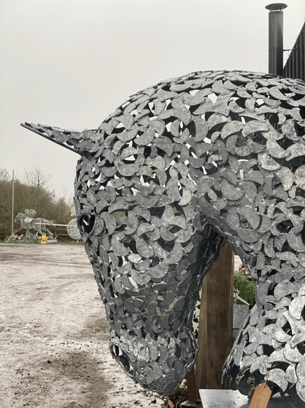 IMG 8043.HEIC Working Horse Head Busk Sculpture Equine Sculpture by British Sculptor Charles Elliott   Handcrafted using plate steel shapes. Finished in a luxurious zinc Galvanised finish to last a lifetime - also available in a Rustic Patina. Currently mounted on a Black Plinth but there is a choice of stone or metal plinths finished in a colour to suit. Illumination kits available for this scuplture.   Approx Dimensions: Height 120cm Width 90cm Length 180cm   All Enquiries Welcome Worldwide Shipping & Installation Available We Welcome Studio Visits - By Appointment Only www.elliottoflondon.co.uk info@elliottoflondon.co.uk 01494 758 896