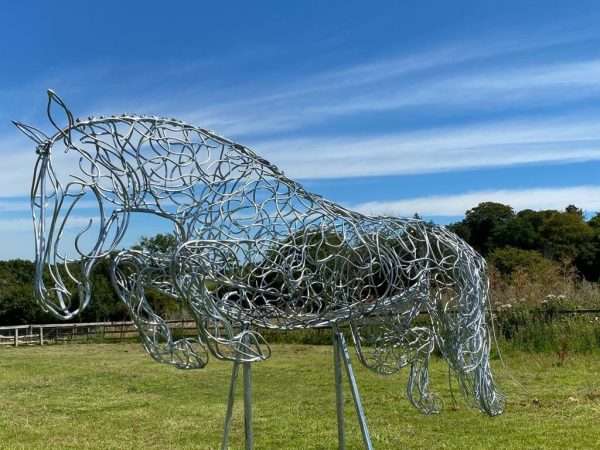 download 35 Our NEW Jumping Horse Sculpture “Grand Prix”By British Sculptor Charles Elliott   This Handcrafted Life Size Jumping Horse Sculpture forms the latest one off sculpture of The Elliott of London Equestrian Sculpture Range. Handmade from 8mm round mild steel to indicate power and flow, luxurious progressive zinc exterior galvanised finish to protect the piece from nature and rust for over 30 years! The support bars will be removed on installation to leave two upright 30mm tubes, then the base frame will be set into the ground creating the jumping illusion.   Dimensions L= 215cm H= 220cm W= 85cm   All Enquiries Welcome Worldwide Shipping & Installation Available   We Welcome Studio Visits - By Appointment Only www.elliottoflondon.co.uk info@elliottoflondon.co.uk 01494 758 896