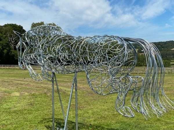 download 38 Our NEW Jumping Horse Sculpture “Grand Prix”By British Sculptor Charles Elliott   This Handcrafted Life Size Jumping Horse Sculpture forms the latest one off sculpture of The Elliott of London Equestrian Sculpture Range. Handmade from 8mm round mild steel to indicate power and flow, luxurious progressive zinc exterior galvanised finish to protect the piece from nature and rust for over 30 years! The support bars will be removed on installation to leave two upright 30mm tubes, then the base frame will be set into the ground creating the jumping illusion.   Dimensions L= 215cm H= 220cm W= 85cm   All Enquiries Welcome Worldwide Shipping & Installation Available   We Welcome Studio Visits - By Appointment Only www.elliottoflondon.co.uk info@elliottoflondon.co.uk 01494 758 896