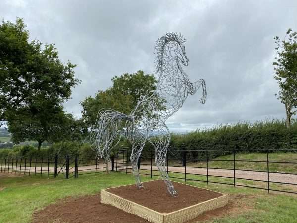 download 58 1 Our NEW Rearing Horse Sculpture By British Sculptor Charles Elliott, Internationally Renown for his Unique Equestrian Sculptures - This Handcrafted Life Size Rearing Horse Sculpture forms the latest one off sculpture of The Elliott of London Equestrian Sculpture Range. Their NEW Equestrian Sculptures are inspired by Charles’s families and own love of horses, each Sculpture in the range is completely unique and built by hand in Hertfordshire. Handmade from 8mm round mild steel to indicate power and flow, luxurious progressive zinc exterior galvanised finish to protect the piece from nature and rust for over 30 years! Delivery and Installation Services Available - Worldwide Shipping and International Delivery Available! All Enquiries Welcome Available to Buy, as well as long term and short term hire! Approx Dimensions: 3.2m high x 2m wide x 1.6m length Studio Office - 01494758896 Charles - 07591730415 Website: www.elliottoflondon.co.uk Email: info@elliottoflondon.co.uk Viewing Welcome by Appointment only