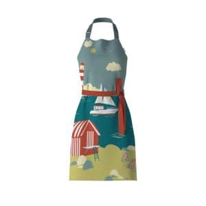 Charlies Coast Bib Apron features our coastal print, including vintage seaside, a beach hut, a lighthouse, a yacht, dolphins and deck chairs.