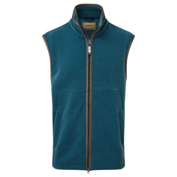 db7d6930 3e41 4fa0 9376 6f3af4d47c3c 03407 1 The Schoffel Oakham Fleece Gilet is the ideal layering piece for all seasons. This country staple can be worn with a shirt or for extra warmth, underneath a jacket. Crafted using premium Schoffel fleece and Schöffel signature trim, the Oakham is both a city and country staple. The Schoffel Oakham fleece can be paired with the Schoffel Shooting Coat collection to provide an extra insulative layer. Features 100% polyester Pontetorto Tecnopile Premium Fleece Regular fit Two-way YKK front zip Schöffel signature brown trim Two external zip security pockets Adjustable draw cord at hem Machine washable