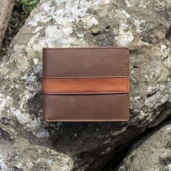 7012 brt w2 Made for our exclusive English Hide Leather Men’s Wallet range – Brown leather wallet with contrasting tan trims and a blue demin lining <div> Smart, stylish and perfectly equipped to meet the demands that come hand in hand with everyday life. </div>