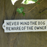 Cast iron Never Mind The Dog Sign