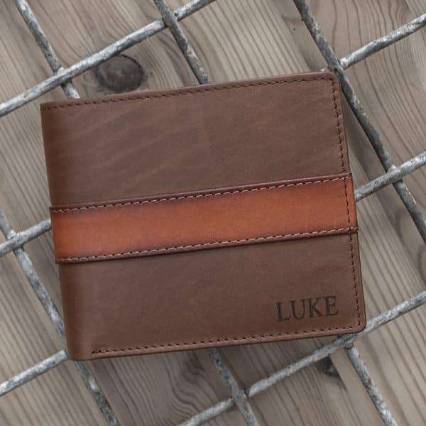 brn tan e cc store Made for our exclusive English Hide Leather Men’s Wallet range – Brown leather wallet with contrasting tan trims and a blue demin lining <div> Smart, stylish and perfectly equipped to meet the demands that come hand in hand with everyday life. </div>
