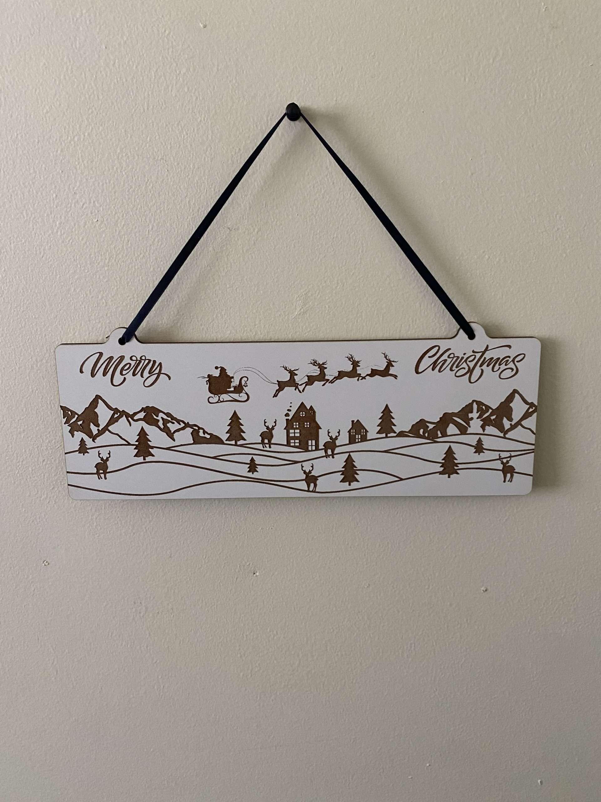 20230925 095304263 iOS scaled Decorative Christmas wall hanger depicting Christmas scene laser cut from 3mm White MDF.