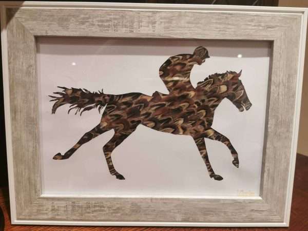 Galloping Feather Racehorse -Shooting Gift -Racing Gift - Game Bird Gift -Pheasant Feather Silhouette Present - Horse Racing. National Hunt Beautiful handmade feather silhouette crafted with hand picked pheasant feathers. Sure to look great in any home or shooting lodge or racing themed house. Picture comes framed and can be mounted if wished. Due to the nature of the feathers no two pictures are the same so may differ slightly from the listing picture. All the feathers are 100% locally sourced and the picture hand crafted on our farm in Devon. Perfect as a gift for anyone with a country/shooting or hunting theme Gift can be personalised with writing or different feathers. Other frames available - please specify in the customisation if you would like a dark, wooden or light frame Available in various sizes