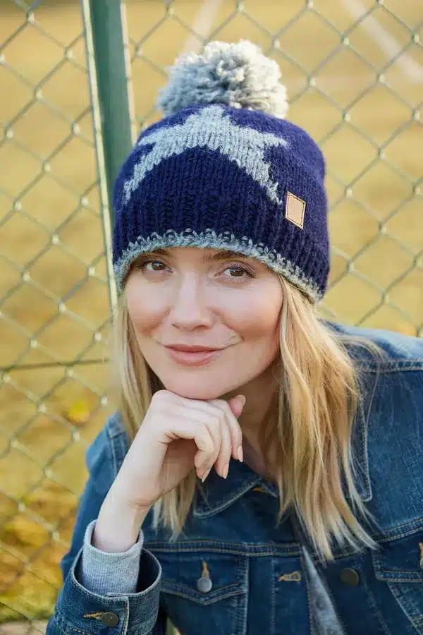 star <p style="text-align: center"><strong><span style="font-size: 18pt">Celestial Star Pattern Bobble Hat</span></strong></p> <p style="text-align: center"><span style="font-size: x-large"><span id="span_description">Shine like a star in our new celestial design. </span></span></p> <p style="text-align: center"><span style="font-size: x-large"><span id="span_description">These bobble hats are fleece lined to keep your ears extra warm.</span></span></p> <h3 id="Sub_Title" style="text-align: center"><strong><span style="font-size: x-large">Women's knitted wool bobble hat.</span></strong></h3> <h3 style="text-align: center"><strong><span style="font-size: x-large"> Grey star motif in navy blue background. </span></strong></h3> <h3 style="text-align: center"><strong><span style="font-size: x-large">Fleece lined for extra comfort. </span></strong></h3> <h3 style="text-align: center"><strong><span style="font-size: x-large">Handmade with love.</span></strong></h3> <ul style="text-align: center"> <li><span style="font-size: x-large">100% Wool</span></li> <li><span style="font-size: x-large">Fleece lined around the forehead for comfort</span></li> <li><span style="font-size: x-large">Hand knitted</span></li> <li></li> </ul> <p style="text-align: center"><b>Colours and patterns may vary slightly due to the handmade nature of this product. </b></p> <div class="row"> <div id="item_price" class="col-sm-12"> <p style="text-align: center"><b>No two items are exactly the same!</b></p> <p style="text-align: center"><b>Handwarmers and headband available in this pattern.</b></p> <p style="text-align: center">All colours are represented as closely as possible, we cannot guarantee 100% accuracy.</p> <h1 style="text-align: center"><strong>FREE P&P</strong></h1> </div> </div>