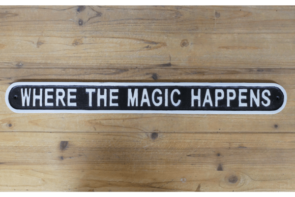 Cast iron Where The Magic Happens sign
