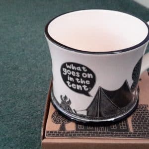 'What goes on in the tent...' mug